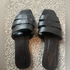 Black leather slides